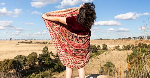 Eden Menta dark hair red clothing