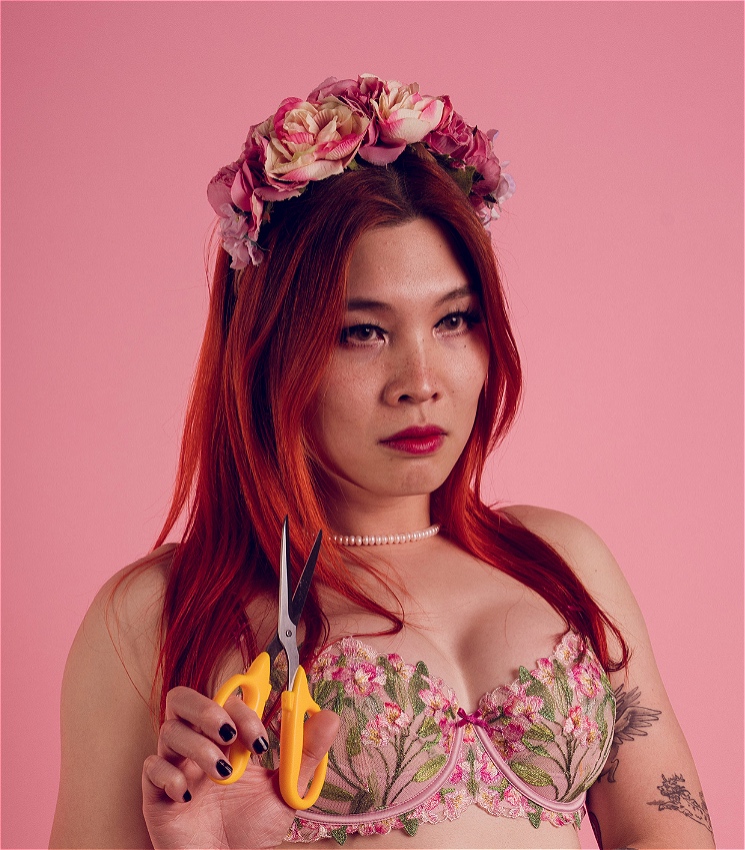 feminine appearance red hair multi-coloured top floral hairpiece