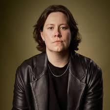 Chloe Petts black round-neck shirt black hair black leather jacket