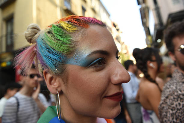 person with hair in rainbow colours