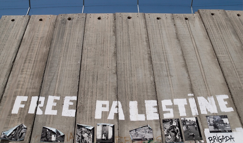 Free Palestine written on Israeli West Bank barrier wall