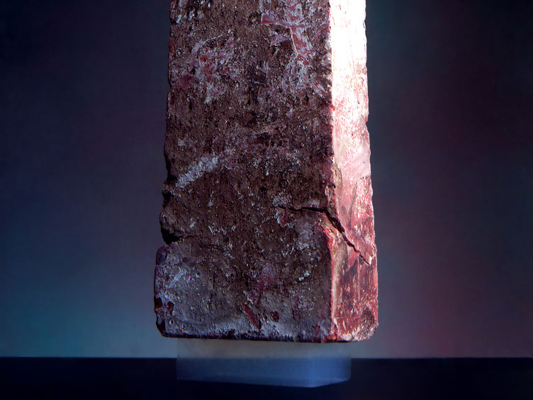 A 2 gram piece of aerogel holding up a 2.5 kg brick (image from NASA/JPL-Caltech)