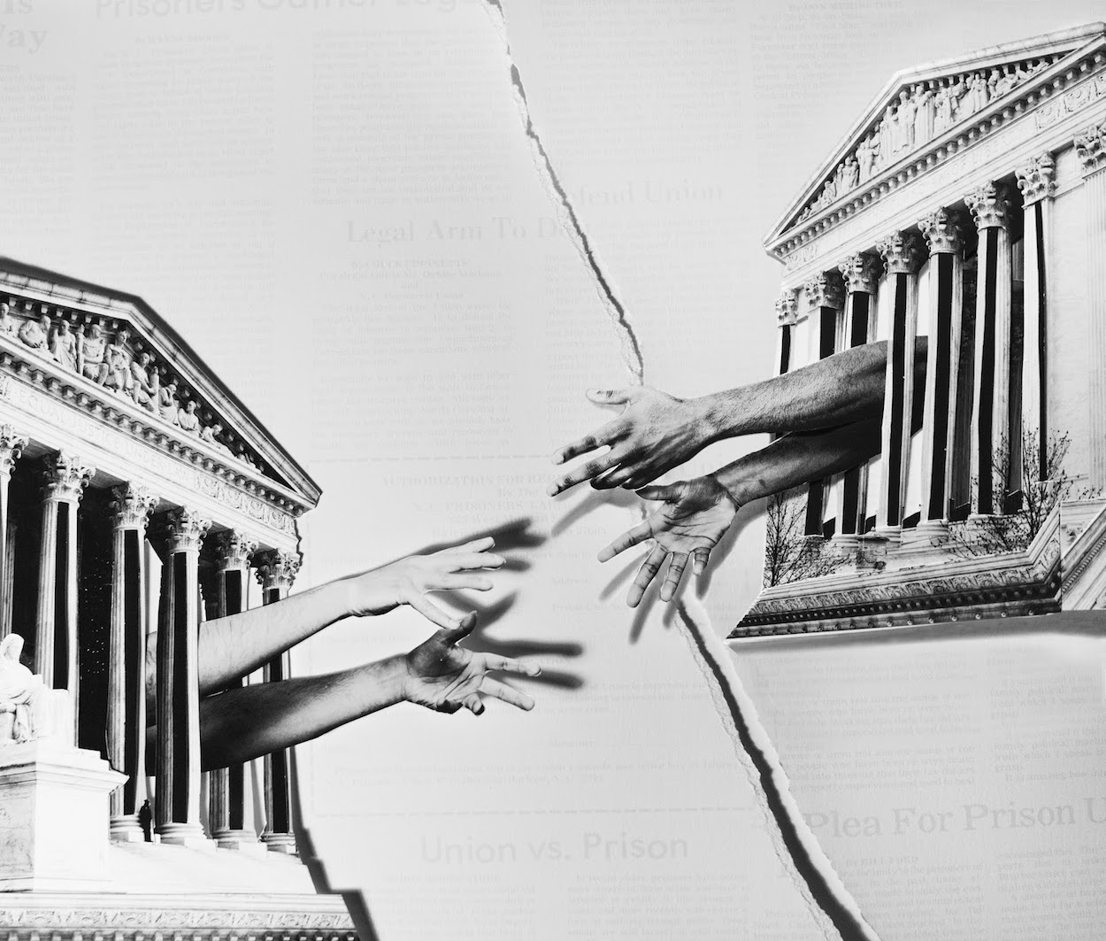 Two pairs of hands reach for each other through prison bars