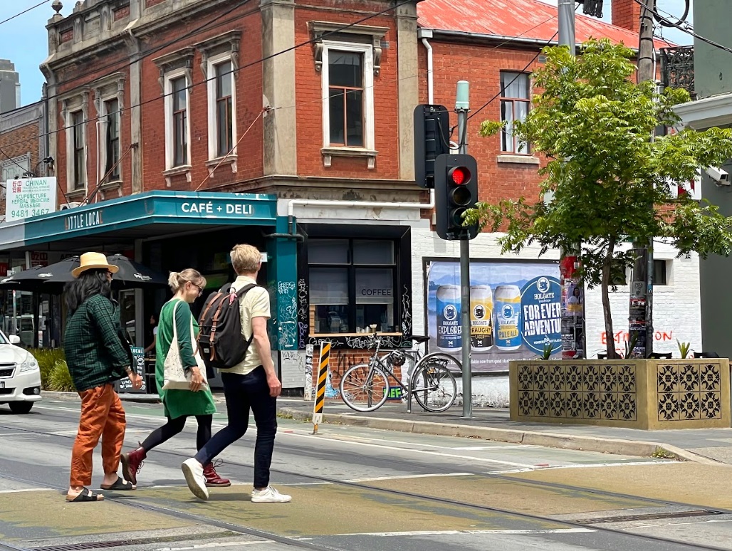 Three people crossing High Street, Northcote. Credit: Streets Alive Darebin