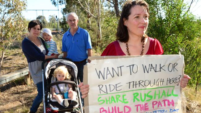 Photo from Melbourne Leader: Zoe Metherell with baby Fraser, Madeline Farrugia with baby Alfie, and Bruce McGregor want a pathway in Rushall Reserve to make it more accessible. Picture: Dennis Manktelow
