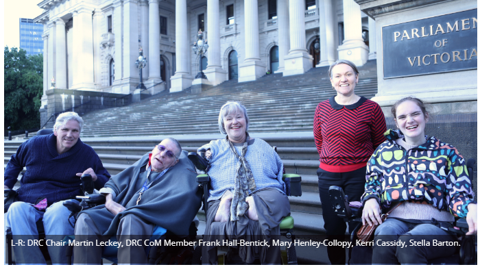 Disability campaigners infront of the steps of Parliament House 