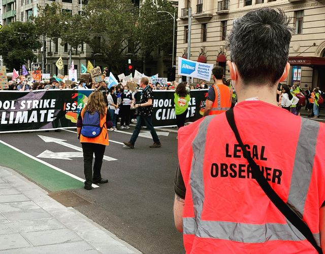 Photo: Legal Observer at the School Strike for Climate rally, 25 March 2022 (from Melbourne Activist Legal Support website)