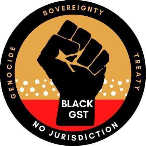 The Black GST logo. The logo is comprised of a black-rimmed circle containing an orange-yellow and red background, with a black fist overlaid. 'Black GST' is written in white on the wrist of the fist. The rim contains the words 'Genocide', 'Sovereignty', 'Treaty' and 'No Jurisdiction'.