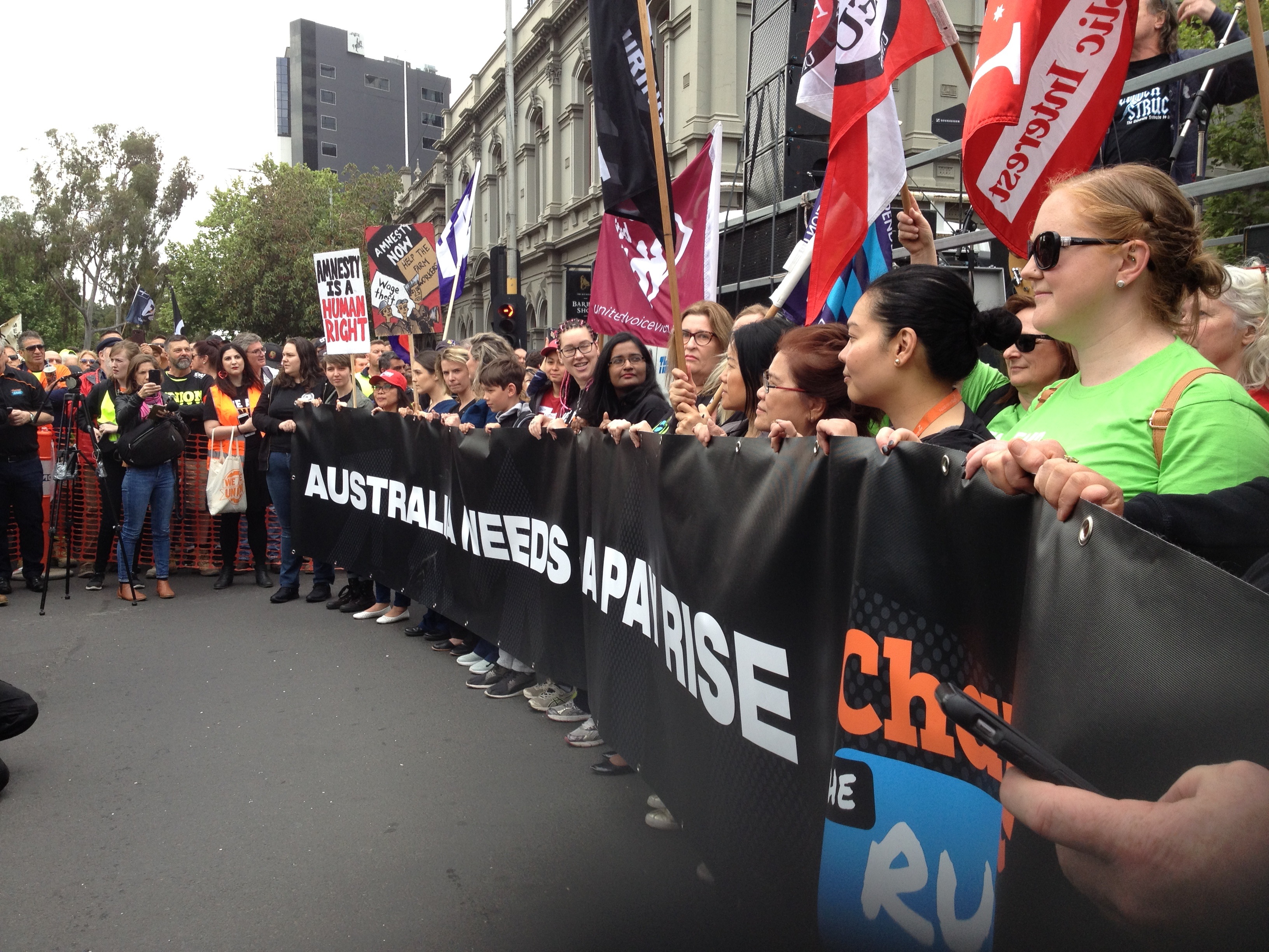Banner stating that Australian Workers Need a Pay Rise