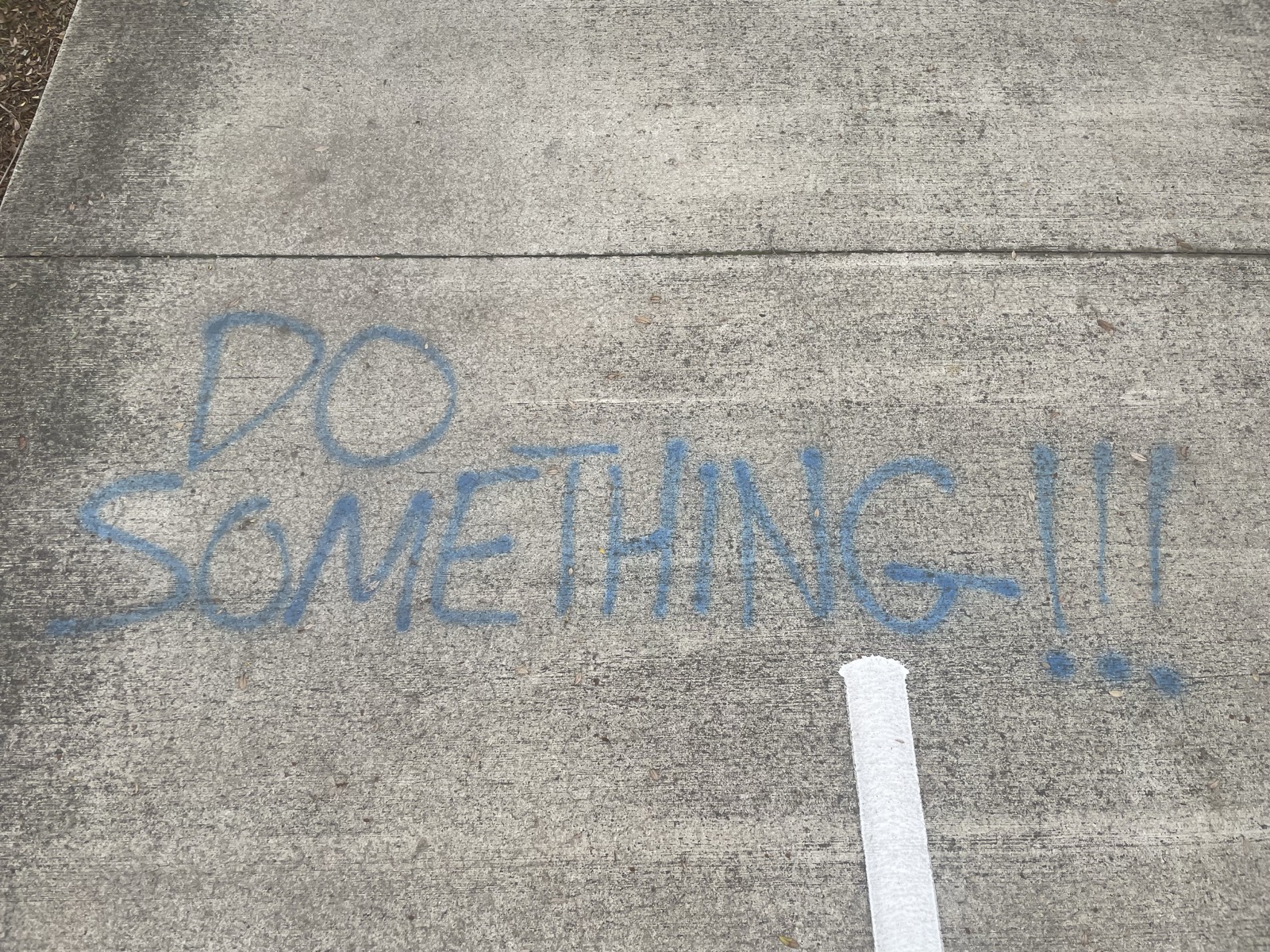 graffiti saying "do something!!!"