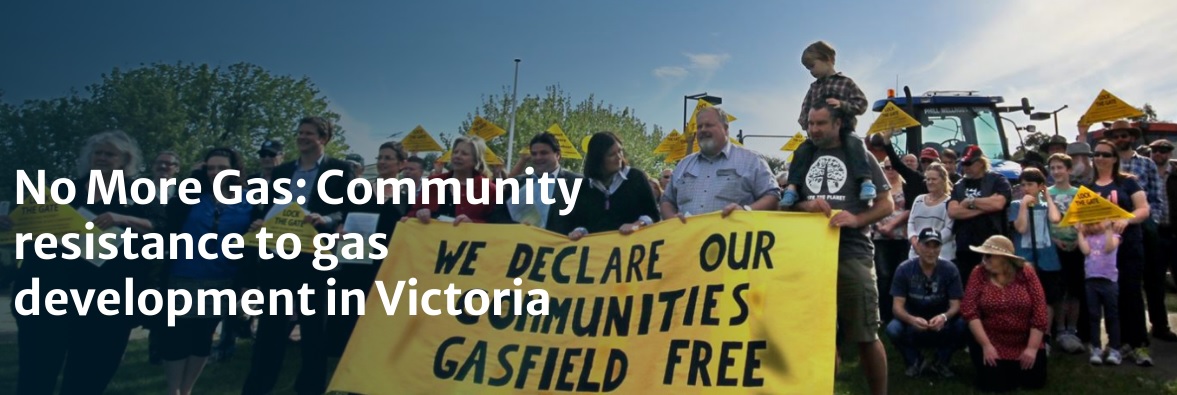 A photo of many people of all ages standing in front of a tractor and holding placards, with many people holding a large handmade banner in the foreground which reads: WE DECLARE OUR COMMUNITIES GASFIELD FREE. There is sext superimposed over the photo which reads "No More Gas: Community Resistance to gas development in Victoria.