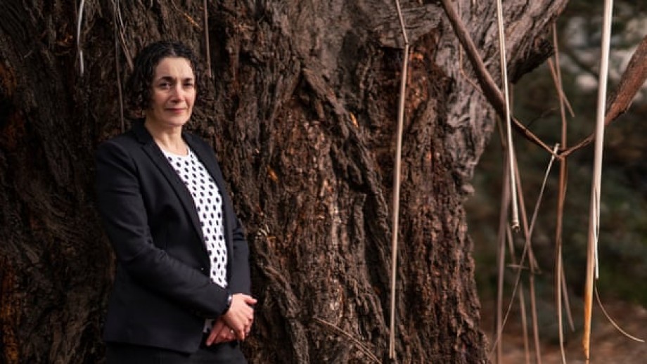A picture of Dr Joelle Gergis standing near trees 