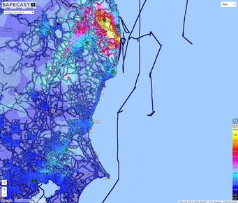 screenshot from Safecast. Map of eastern coast of japan showing radiation levels using colour - mostly blues, but red and yellow around Fukushima.