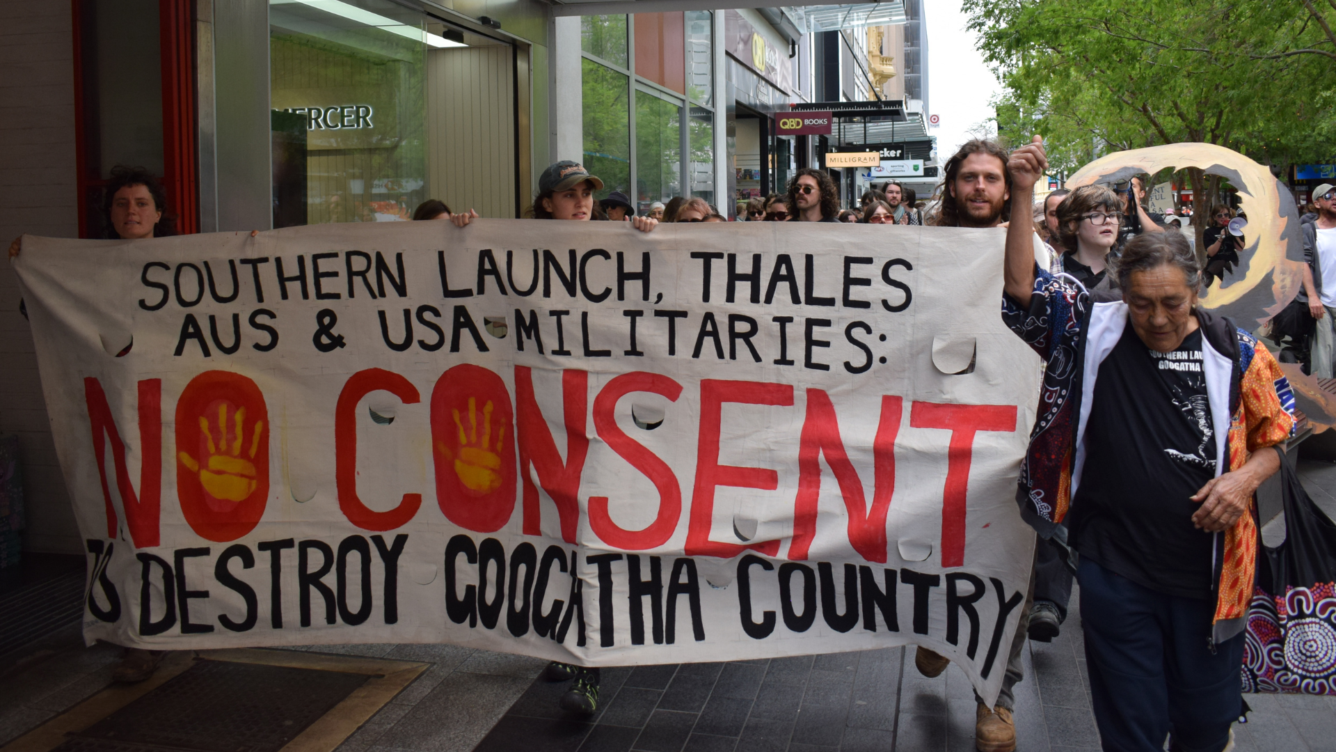 Googatha elder Aunty Sue Haseldine leads a rally against rocket testing in Adelaide on 10 October.
