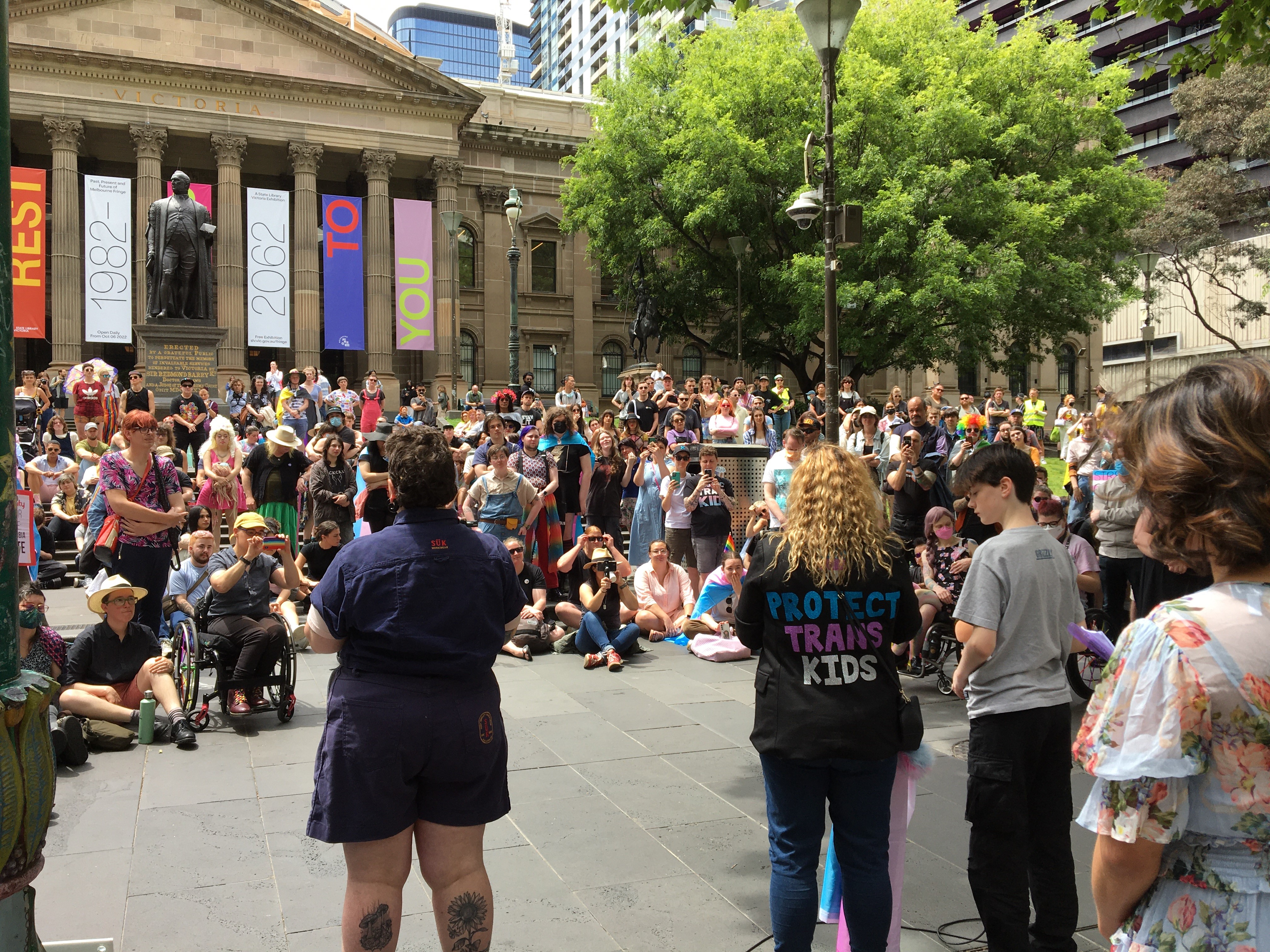Merrin & Jay Wake speaking at the Trans Pride Rally Melbourne in front of the State Library of Victoria on Sunday 13 November.