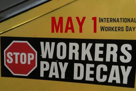 'Stop workers pay decay' sticker.