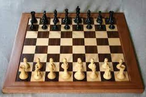 chess board with pieces in starting positions