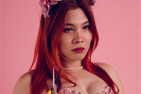 feminine appearance red hair multi-coloured top floral hairpiece