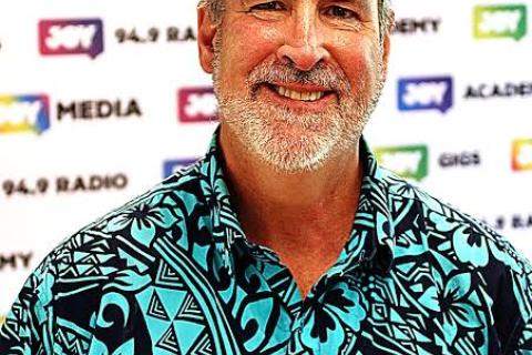  Paul Byrne-Moroney grey hair green shirt