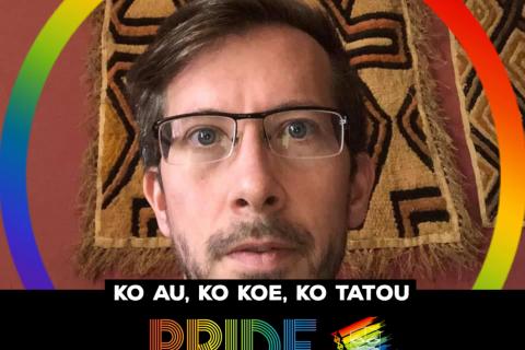 A. James Baker headshot; person with glasses and facial hair