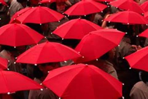 image of numerous red umbrellas (sex worker symbol)