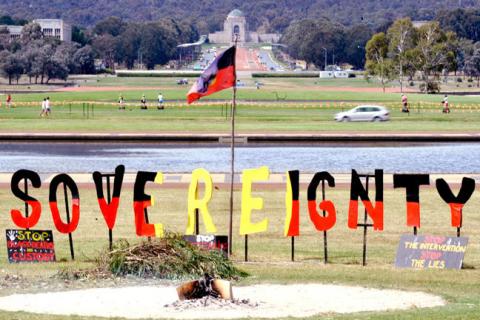 A coloured photograph of the sacred fire at the Aboriginal Tent Embassy in Canberra. Picture: AAP