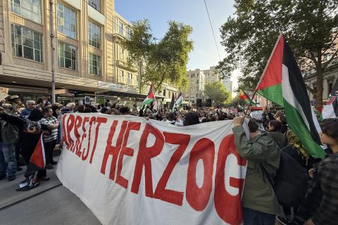 "Arrest Herzog!" banner at the protest against israeli president's inivitation and visit to australia