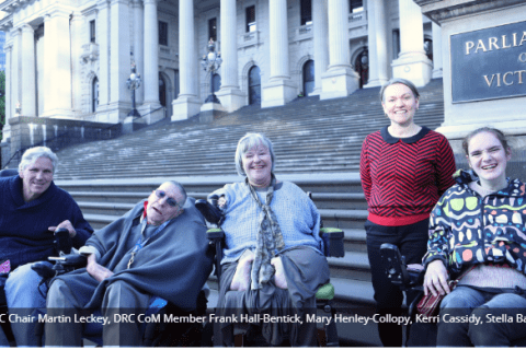 Disability campaigners infront of the steps of Parliament House 