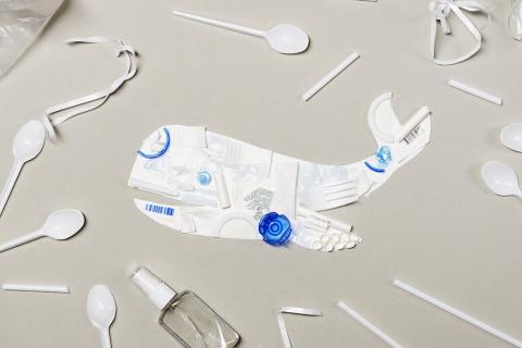 An image of a whale comprised of plastics waste products