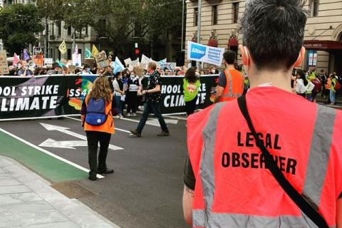 Photo: Legal Observer at the School Strike for Climate rally, 25 March 2022 (from Melbourne Activist Legal Support website)