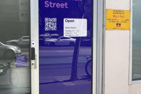 Purple glass door entrance to Victorian Pill Testing Service at 95 Brunswick St, Fitzroy VIC 3065.