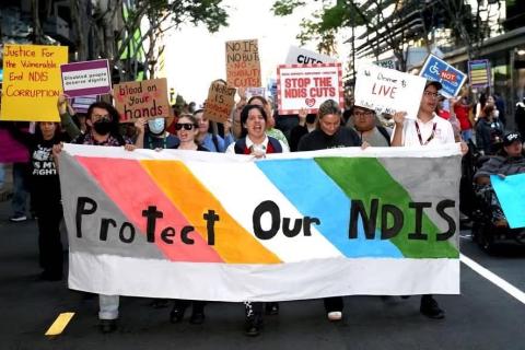 Protect Our NDIS Rally: People holding banners