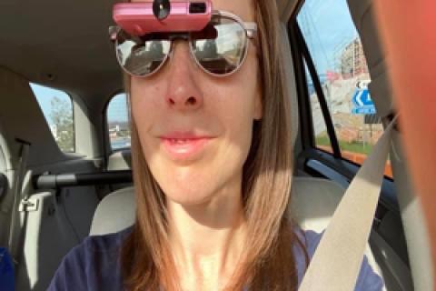 Jo wearing Biopic Glasses learning to drive