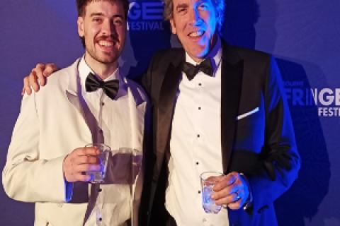Campell Jordan wearing a White Jacket and Peter Jordan wearing a Black Jacket at Melbourne Fringe Opening Night
