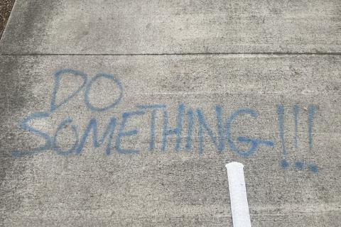 graffiti saying "do something!!!"