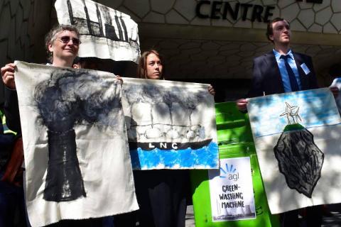 Protesters with the AGL "green washing" machine