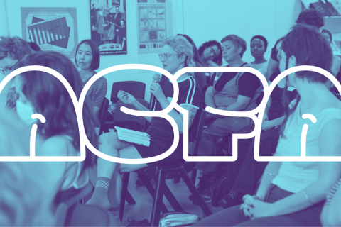 Photograph of audience at the A Climate for Art Symposium, with ACFA logo.