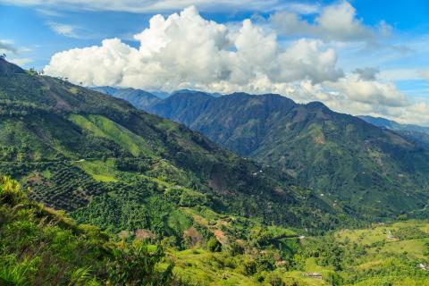 Green mountains in Colombia, blue sky with clouds 