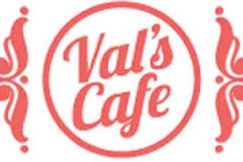 A logo with the words 'Val's Cafe' in a circle