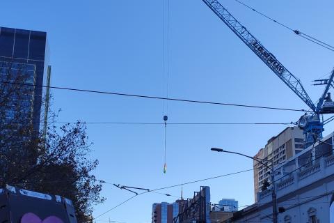 The moment at the May 22nd Free Palestine rally workers in solidarity flew the Palestinean flag