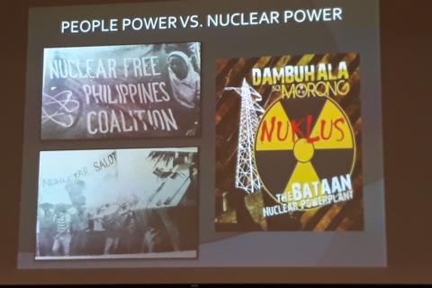 A screen from a presentation that says "People power vs nuclear power" with three pictures of people protesting
