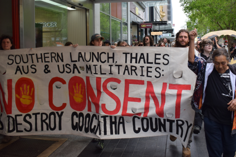 Googatha elder Aunty Sue Haseldine leads a rally against rocket testing in Adelaide on 10 October.