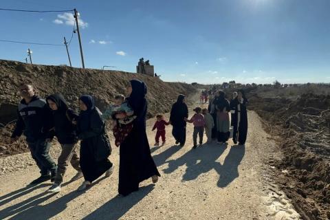 Palestinians near the Netzarim corridor, 27 January 2025. Omar AshtawyAPAimages