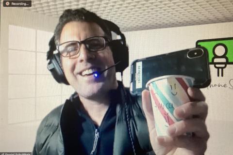 Cinespace founder Daniel Schultheis holds up a makeshift smartphone-holder for filming.