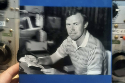 Matt Munster with a picture of Jim Maxwell