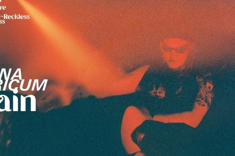 The album artwork for Villain, featuring a smoky orange and black background with the artist Simona Castricum in front wearing black sunglasses
