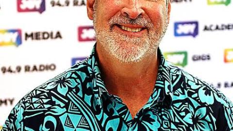  Paul Byrne-Moroney grey hair green shirt