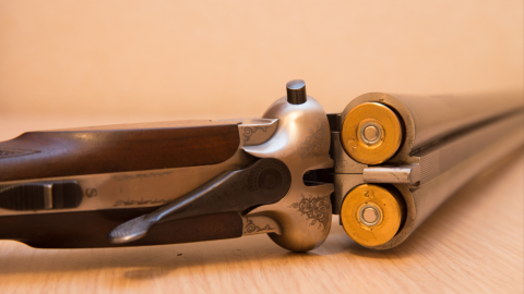 An image of an open double barrel shot gun