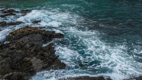 Rocky shoreline with waves crashing