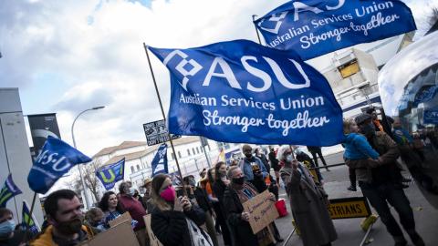Photograph of council workers marching in 2021 holding banners reading "ASU AUSTRALIAN SERVICES UNION STRONGER TOGETHER".